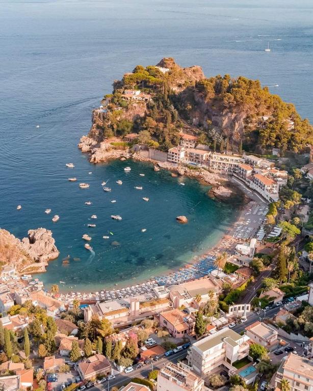 Best 2.5-Hour Sunset & Dolphins Boat Tour in Taormina, Giardini Naxos & Isola Bella!